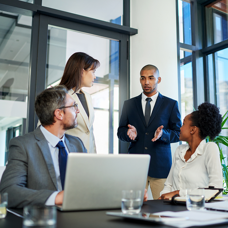 Business people and meeting in office with laptop for teamwork collaboration and plan as